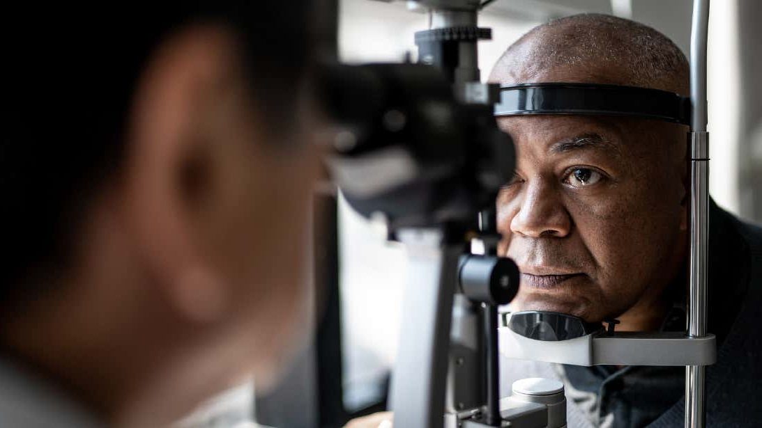 Older Man at the Optometrist’s Office Having Eye Examination.
